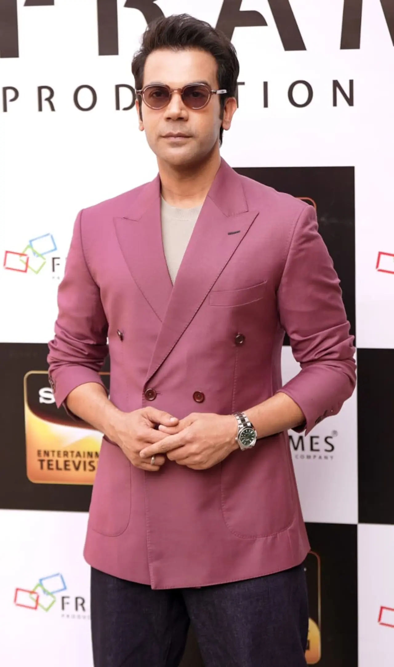 Rajkummar Rao looked smart in a rose-colored blazer with a simple T-shirt and dark pants. He completed the look with sunglasses and a watch, keeping it stylish yet easy and relaxed.